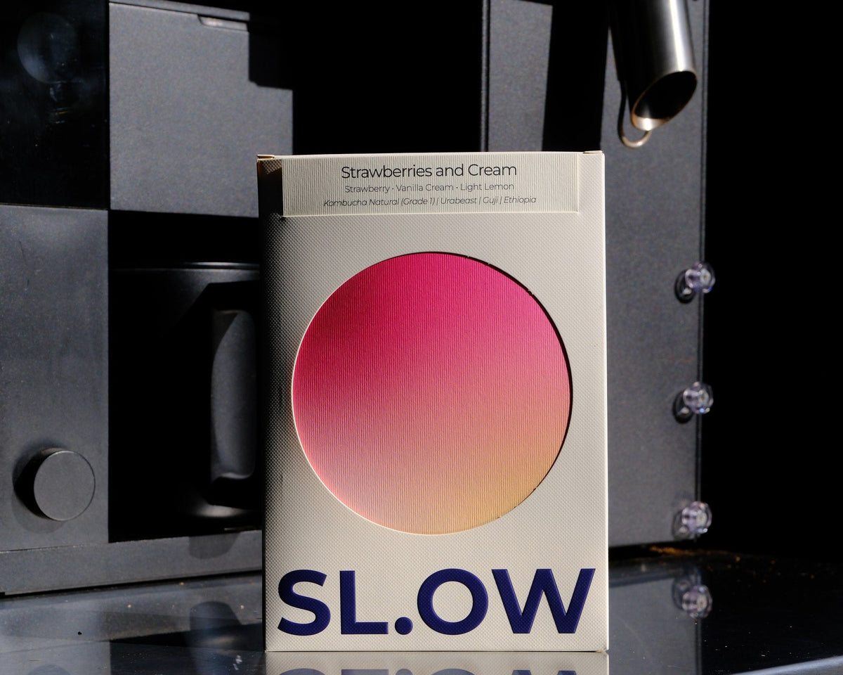 Strawberries and Cream SL.OW box in morning light on the roastery bench