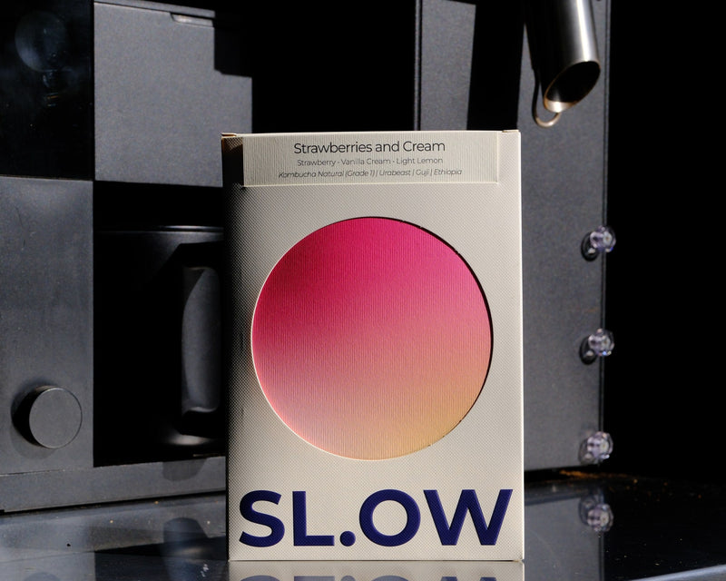 Strawberries and Cream SL.OW box in morning light on the roastery bench