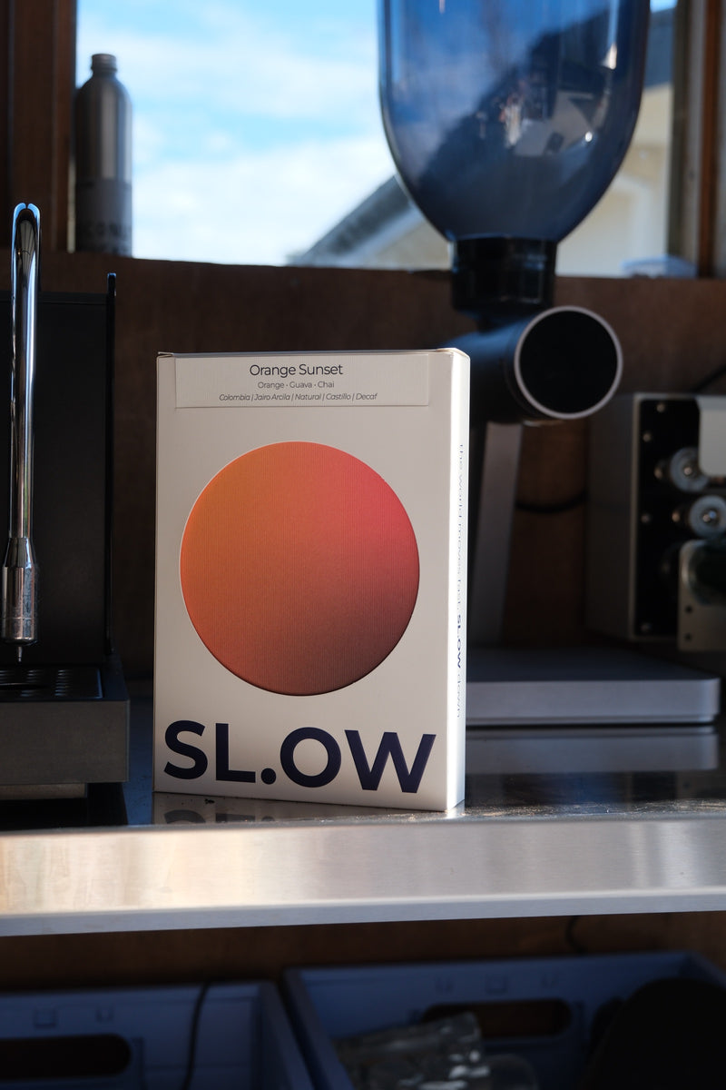 Orange Sunset Colombian Decaf — package in the roastery
